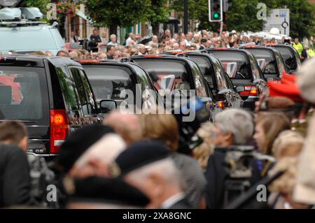 The scene in Wootton Bassett, Wiltshire today as the bodies of five service men killed in Afghanistan are repatriated to the UK. Crowds of family members, friends and members of the public lined the streets to pay their respects to the fallen on their return to the UK. 10/7/2009 Stock Photo