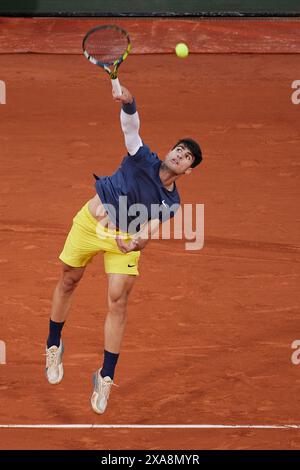 Paris, France. 04th June, 2024. Carlos Alcaraz of Spain serves against Stefanos Tsitsipas of Greece in the Men's Singles Quarter Final match during Day Ten of the 2024 French Open at Roland Garros on June 04, 2024 in Paris, France. ( Credit: QSP/Alamy Live News Stock Photo