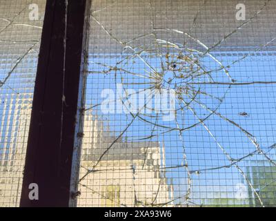 Broken glass pane after a break-in Stock Photo