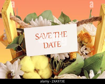 SAVE THE DATE concept in a bouquet of flowers on a white business card Stock Photo