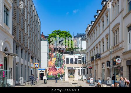 Wiesbaden, Germany - May 25, 2024: view to remains of former city wall and view to shops downtown Wiesbaden. Stock Photo