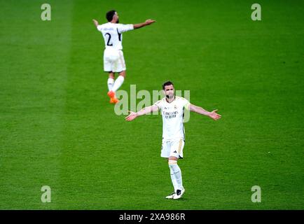 Real Madrid's Nacho Fernandez celebrates after team-mate Daniel Carvajal scores their side's first goal of the game during the UEFA Champions League final at Wembley Stadium in London. Picture date: Saturday June 1, 2024. Stock Photo