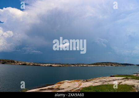 Storm clouds over Islands on the western coastline of Sweden Stock Photo