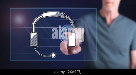 Man touching a technical support concept on a touch screen with his finger Stock Photo