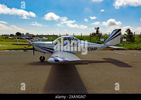 An Evektor EV-97 EuroStar, taxiing in, after landing, during the Kent Strut charity fly-in to Manston, Kent Stock Photo