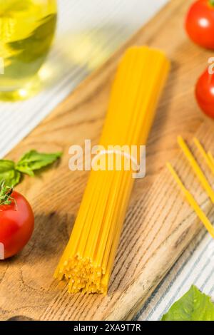 Dry Raw Yellow Italian Spaghetti in a Bundle Stock Photo