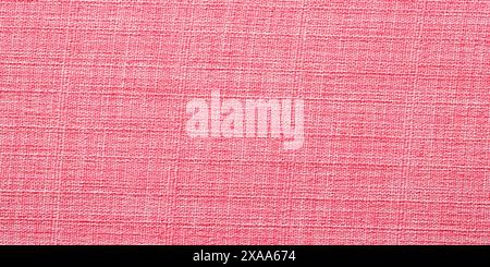 light fabric texture as background, red cotton Stock Photo