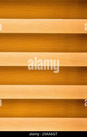 A brown and yellow striped backdrop with grid textures Stock Photo