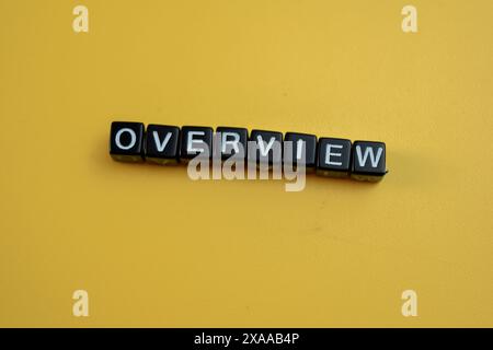 Concept of The wooden Cubes with the word Overview on wooden background. Stock Photo