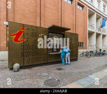 Turin, Italy - June 9, 2019: Street in the old town (Via Verdi) with kiosk for tourist information. Stock Photo