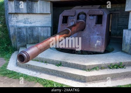 The image is of what remains of the Second World War German coastal gun battery of Longues sur Mer on the Normandy coast being part of the German Atlantic Wall defences. Stock Photo