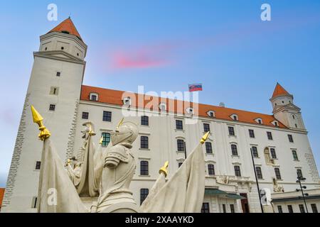 Stone Guards statues at Vienna Gate before Bratislava Baroque Castle, Bratislava, Slovakia, Europe Stock Photo