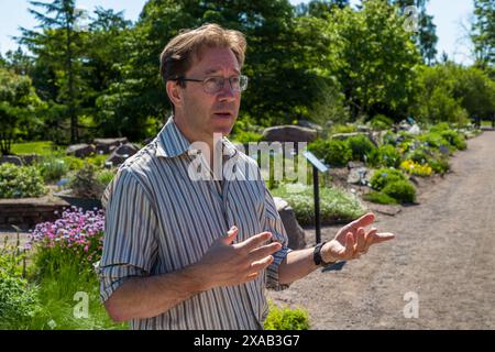 Jesper Kårehed, scientific curator at Uppsala Botanical Garden during a guided tour. Triangeln, Uppsala, Sweden Stock Photo