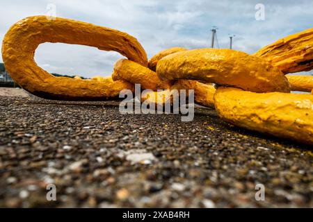 A boat mooring chain on the pier in Howth, Dublin, Ireland. Stock Photo