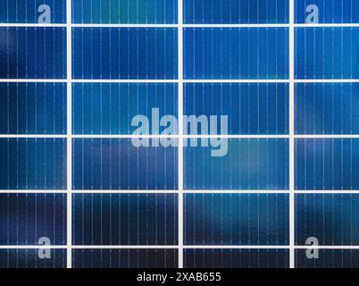 Closeup photography of real solar panel in solar farm. Photovoltaic surface high quality background. Stock Photo