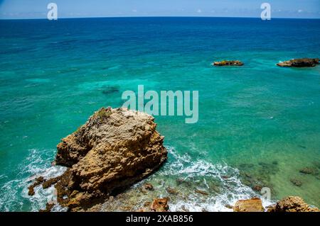 Cabo Rojo's rocky shoreline in Puerto Rico's aqua blue crystal clear atlantic ocean shoreline. Stock Photo