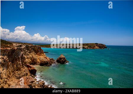 Cabo Rojo's rocky shoreline in Puerto Rico's aqua blue crystal clear atlantic ocean shoreline. Stock Photo