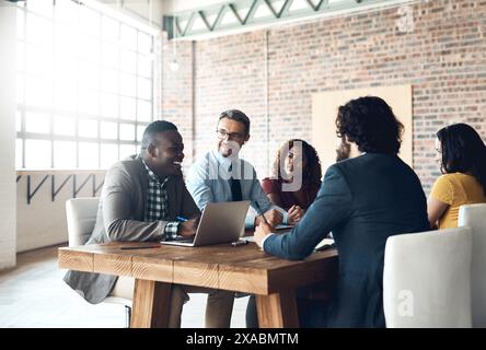 Designers, happy or manager in meeting for brainstorming, collaboration or teamwork for solution. Talking, business workshop or people in group for Stock Photo