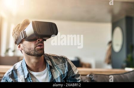 Wow, man and virtual reality headset in home lounge of cyber experience, metaverse system or gaming connection. .Surprised gamer, VR or games in Stock Photo