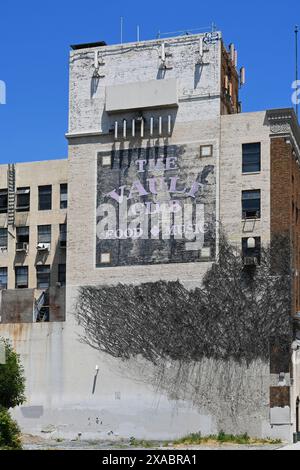 POMONA, CALIFORNIA -  18 MAY 2024:  Closeup of the fading sign on The Vault Club, Downtown Pomona, the former bank building in is disrepair. Stock Photo