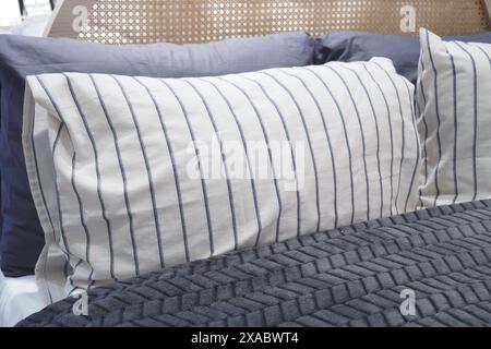 white pillow lined up on bed  Stock Photo
