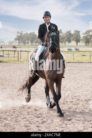 Horse, walking and woman on ranch or farm for fitness, training and sport or competition. Event, animal and female jockey in countryside for course Stock Photo