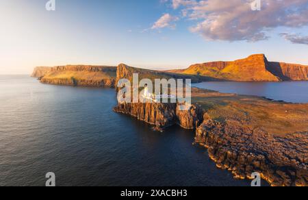 Panoramic and Aerial view during sunset at Neist Point lighthouse, Isle of Skye, Inner Hebrides, Highlands, Scotland, United Kingdom Stock Photo