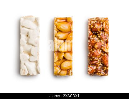 Close Up of almond Brittle Bars With Caramelized Coating isolated on a white background. Stock Photo