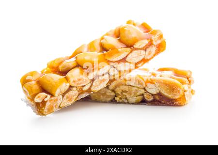 Close Up of almond Brittle Bars With Caramelized Coating isolated on a white background. Stock Photo