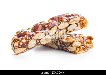 Close Up of almond Brittle Bars With Caramelized Coating isolated on a white background. Stock Photo