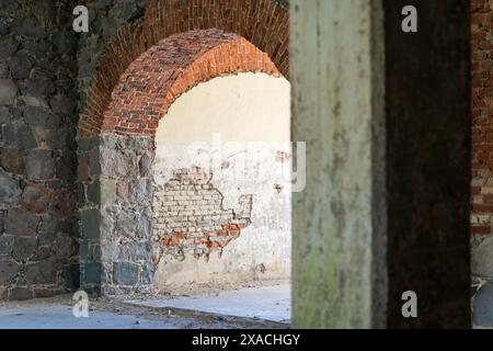 Interior of abandoned fish factory building Old abandoned fish factory interior. Stock Photo