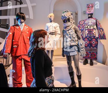 Somerset House, London, UK. 06th June, 2024. Outfits worn by famous faces: Harry Styles, Charli XCX, Tilda Swinton, Faris Badwan of The Horrors and K-pop star Mino.   Scottish-born designer and illustrator Charles Jeffrey exhibition that include the full spectrum of his prolific output as well iconic collaborations, celebrating 10 years of LOVERBOY. 8 June Credit: Paul Quezada-Neiman/Alamy Live News Stock Photo