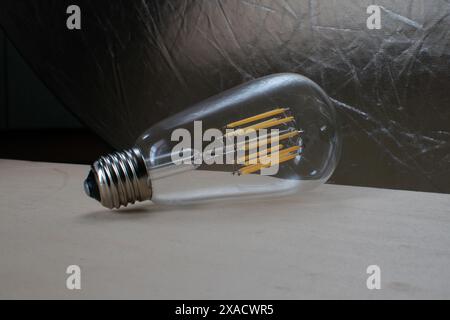 Eco-sustainable LED bulbs not only have a longer life cycle, but can be recycled. The LED is the semiconductor that produces brightness when electric Stock Photo