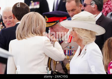 King Charles III greets French President Emmanuel Macron and wife ...