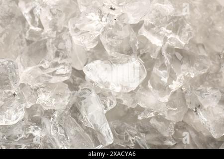 Pieces of crushed ice as background, closeup Stock Photo