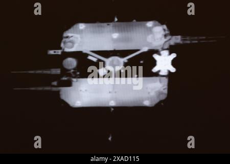 (240606) -- BEIJING, June 6, 2024 (Xinhua) -- This image taken at Beijing Aerospace Control Center (BACC) on June 6, 2024 shows the ascender of China's Chang'e-6 probe rendezvousing and docking with the probe's orbiter-returner combination in lunar orbit. The ascender of China's Chang'e-6 probe successfully rendezvoused and docked with the probe's orbiter-returner combination in lunar orbit at 2:48 p.m. (Beijing Time) on Thursday, the China National Space Administration (CNSA) announced. The container carrying the world's first samples from the far side of the moon had been transferred from Stock Photo