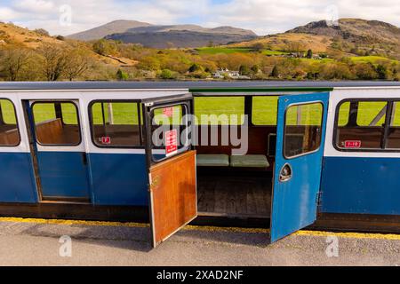 A stationary carriage of the Ravenglass-Eskdale narrow-gauge steam railway at Dalegarth station in the Lake District National Park, Cumbria, England. Stock Photo