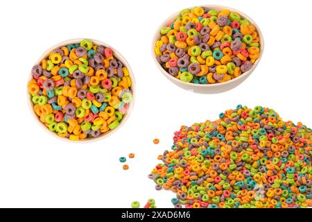 Colorful rings cereal spill out into a bowl. Breakfast. Isolated on a white background. Stock Photo