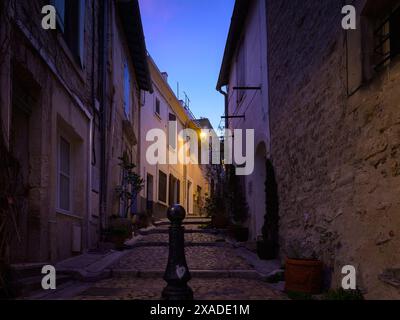 Arles, France - March 13, 2023: Empty street in the center of Arles (France) on a clear day in winter Stock Photo