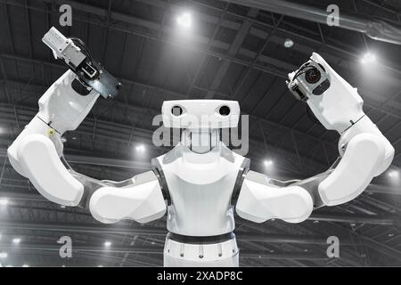 Industrial robot installing a computer chip at production line i Stock Photo