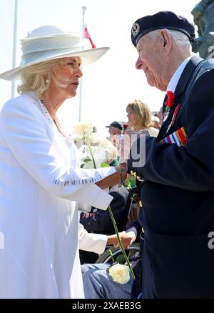 Queen Camilla and veteran Henry Rice at a reception for veterans who ...