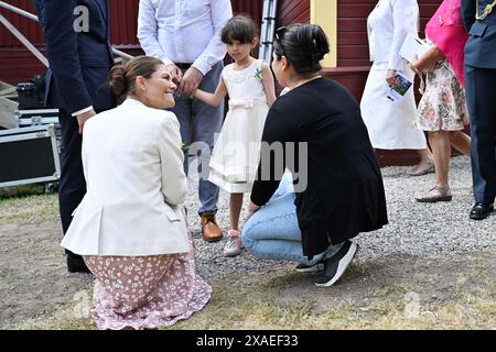 Stockholm, Sweden. 06th June, 2024. Prince Daniel, Crown Princess Victoria with Fahima Schiwa and Hoshan Schiwa with children Eliza and Rayan at the celebration of Sweden's National Day in People's Park in Nykvarn outside of Stockholm. The Schiwa family celebrates that their daughter has become a Swedish citizen. Nykvarn, Sweden on june 06. 2024.Photo: Henrik Montgomery/TT/Code 10060 Credit: TT News Agency/Alamy Live News Stock Photo