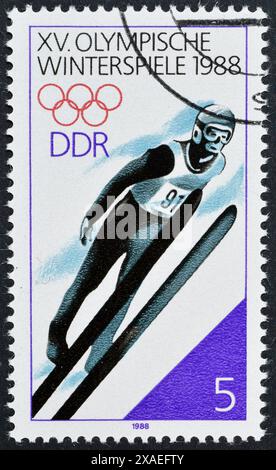Cancelled postage stamp printed by German Democratic Republic, that shows Ski Jumping, Winter Olympic Games 1988 - Calgary, circa 1988. Stock Photo