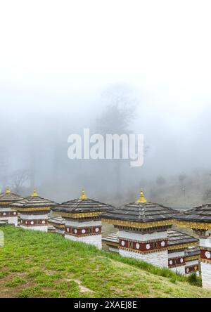 Dochula with 108 stupas or chortens in the fog, Punakha, Dochula Pass, Bhutan Stock Photo