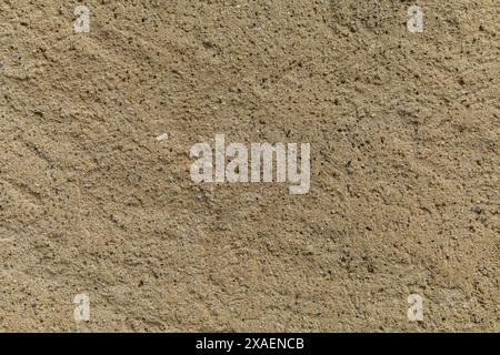 flat photography of a beige yellow sandstone surface, natural sand rock textured background Stock Photo