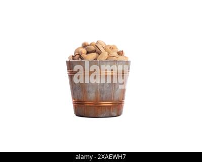 bucket with pistachios isolated on white background Stock Photo