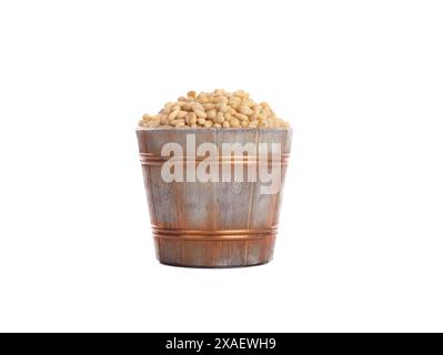 festive bucket with pine nuts isolated on white background Stock Photo