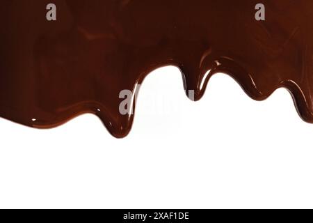 Melted chocolate dripping on white background Stock Photo
