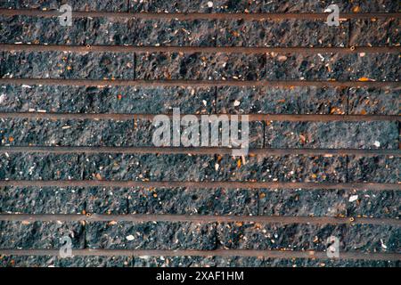 Brick wall background of reall wall with grey and black and cupper color colors Stock Photo
