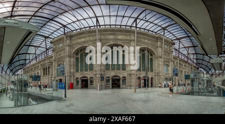 Strasbourg, France - 06 29 2023: View inside the modern Strasbourg train station building with travelers Stock Photo